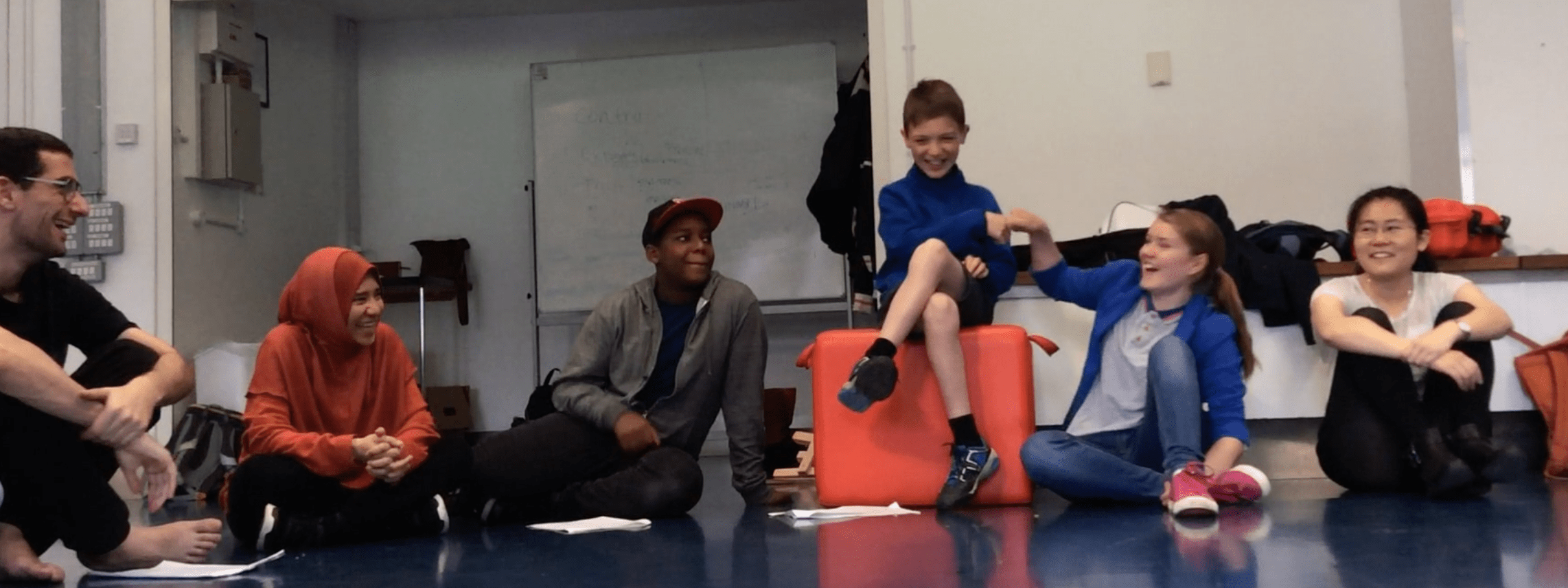 Coventry youth giving each other a fist-bump