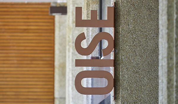 A sign outside the OISE building.