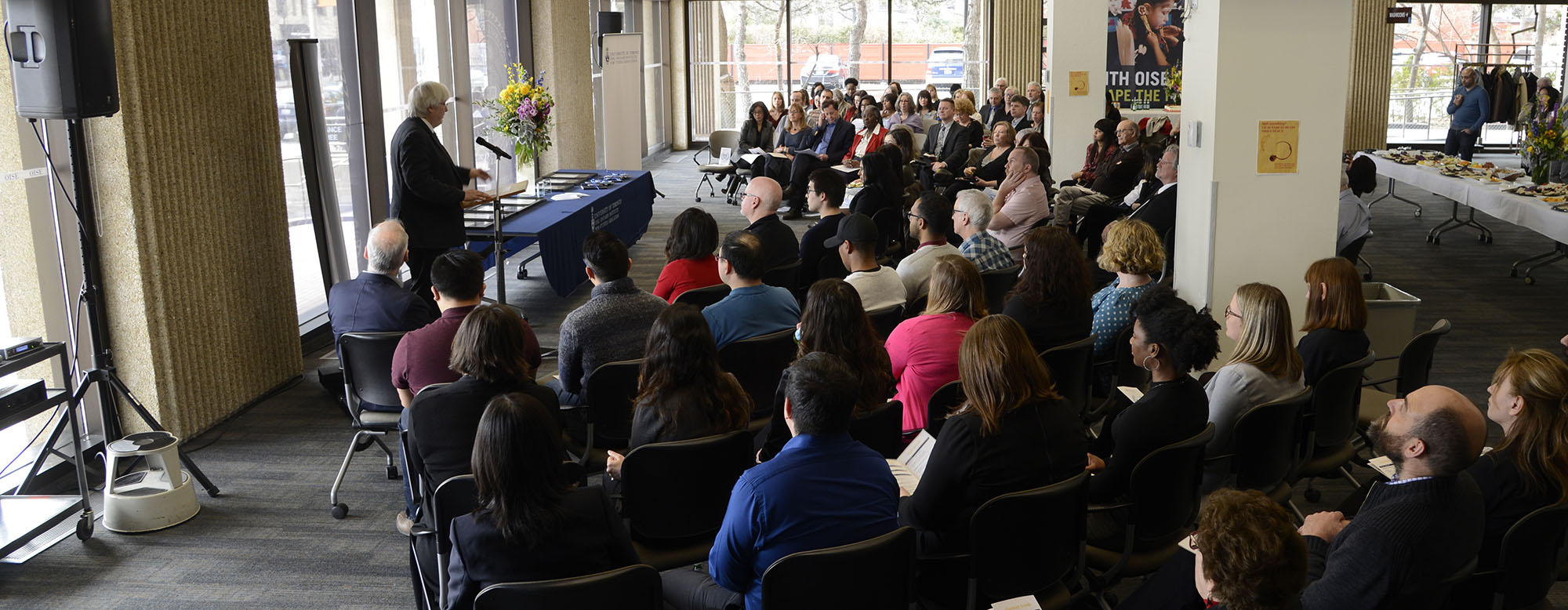 Glen Jones speaking at an OISE event.