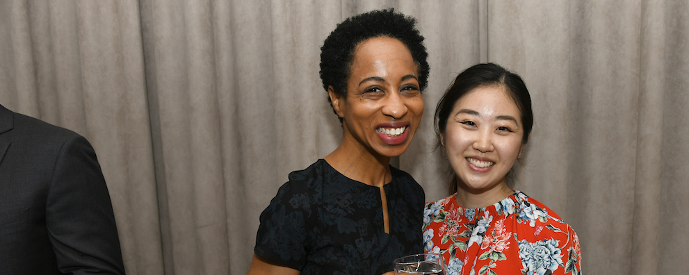 Two individuals attending a Leaders & Legends event. 