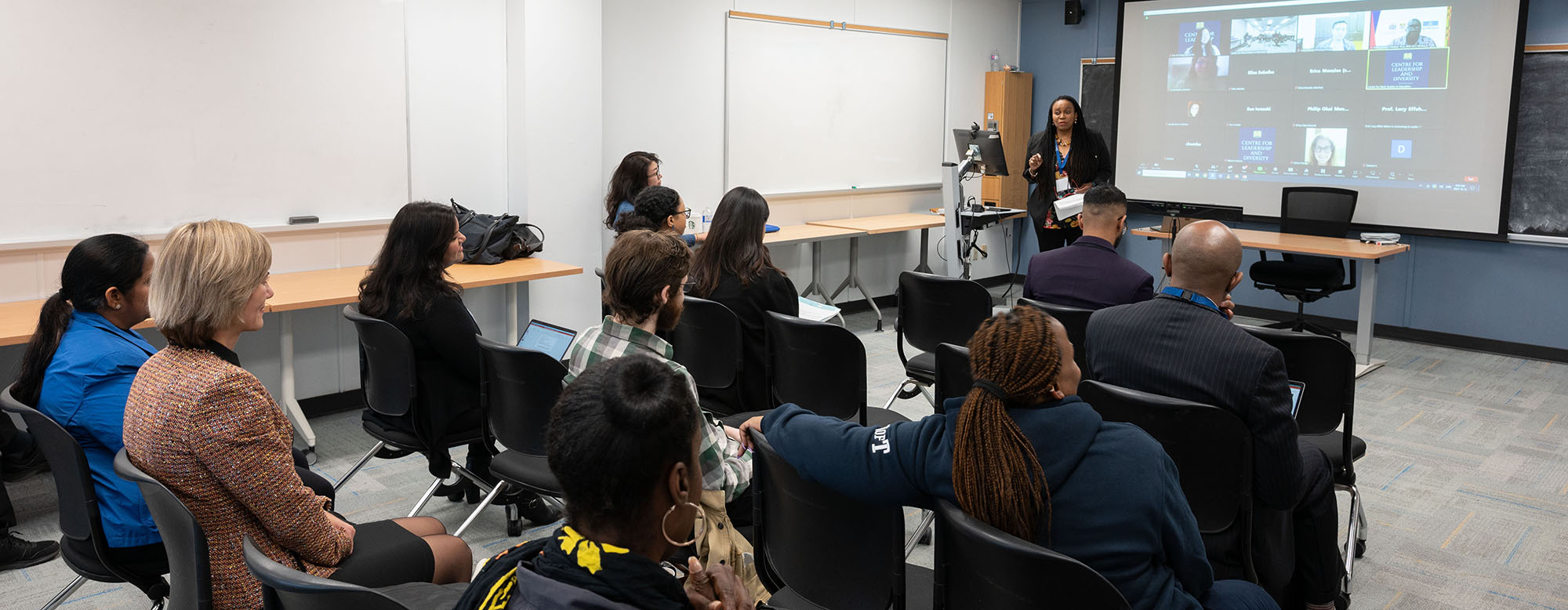 A group of people attending a presentation at the Centre for Leadership & Diversity (CLD) 4th Annual International Conference.