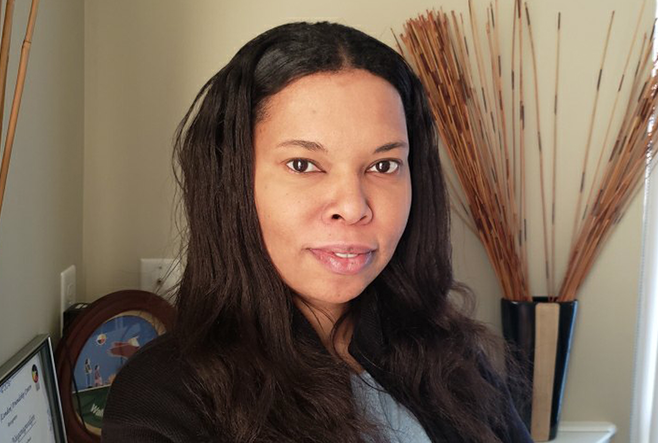 A woman with black long hair.