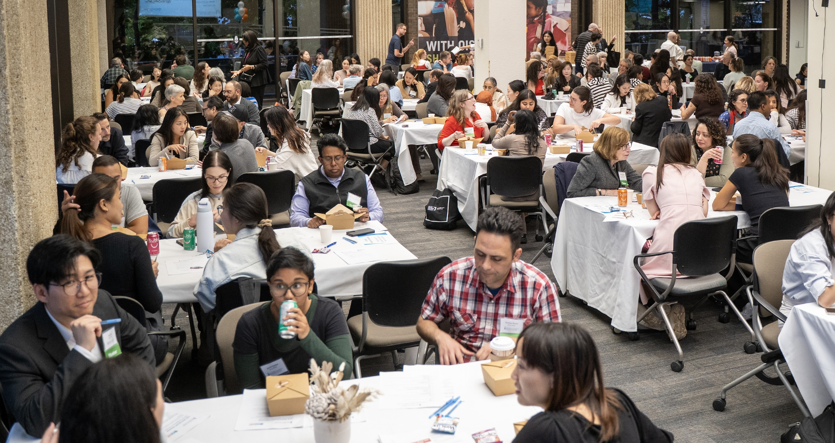 Participants mingling at the 2025 Mentorship Program launch on Oct. 7 at the OISE Library