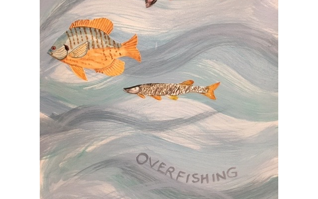detail of fish collage on a sea-like mural