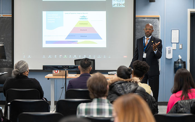 A presenter presenting at the 4th Annual CLD International Conference.