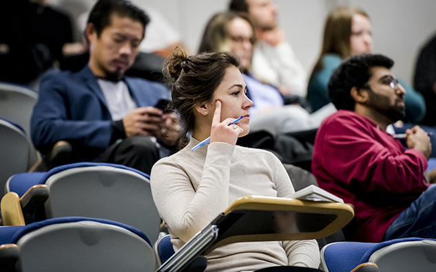 A group of people attending a lecture.