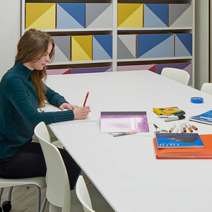Two students working in a room at OISE.