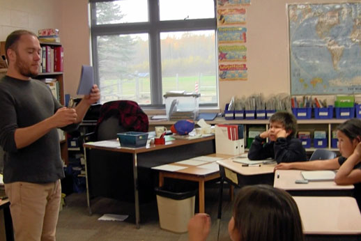 Chris leading his Grade 3 class in the Hole Punch Game