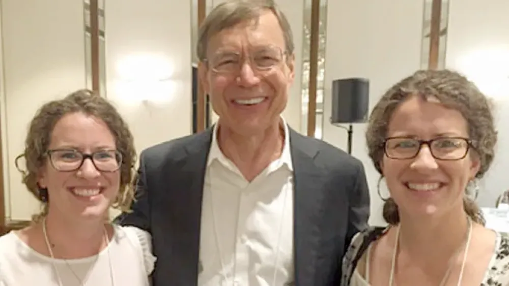 Nicole Thomson and Michelle Cain pictured with Dr. Douglas H. Clements