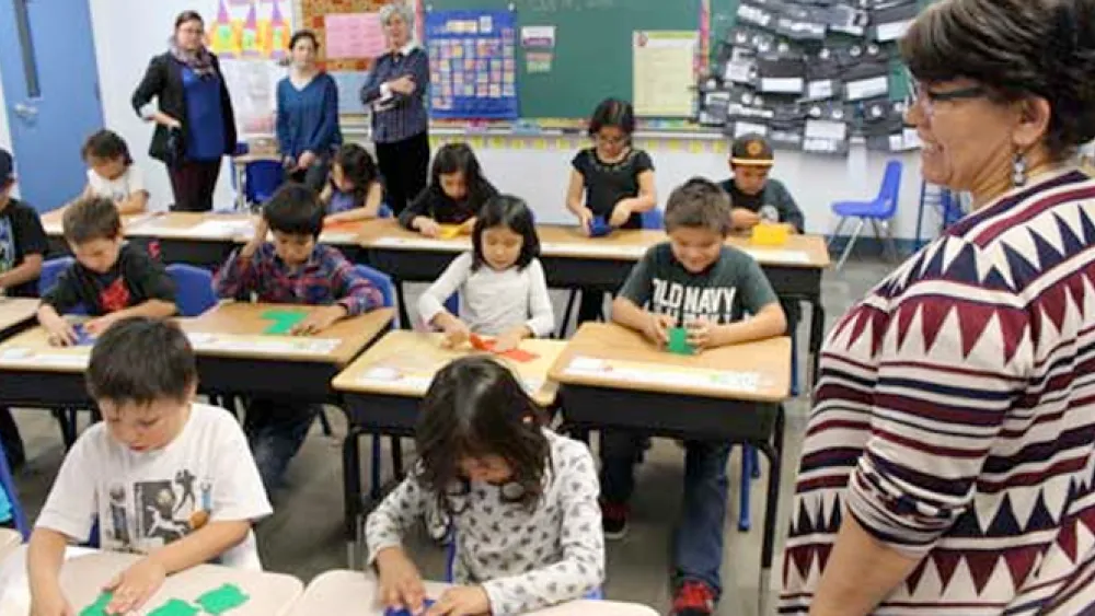 Students playing with math manipulatives