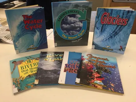Water-related books on a table