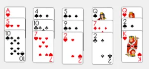 Four stacks of playing cards.