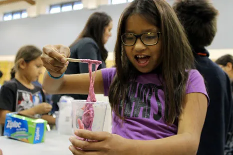 A Pegamigaabo student uses chemistry to create a new substance.
