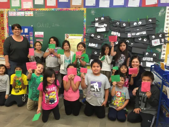Jane’s class shows you where the hole punches are when the paper is folded up