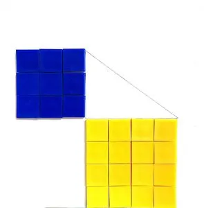 A blue and yellow square beside a triangle.