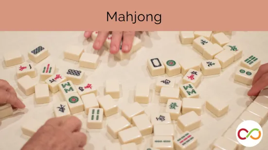 Two people playing Mahjong.
