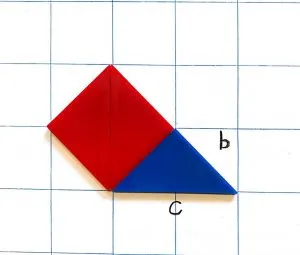 A red square beside a blue triangle.