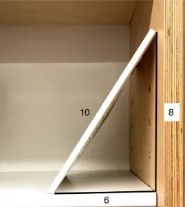 An angle being made using some type of cardboard or wood.