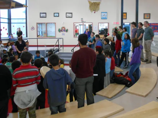 The Robertson team watches as we are given the gift of the Eagle Song